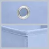 Close-up views of a light blue fabric storage box, showing a metal grommet and stitching details. Produktbild-Vorschau