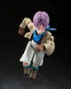 A full-body shot of an action figure of the character Trunks from Dragon Ball GT, depicted in a dynamic running pose against a black background. Voir les images du produit