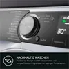 Close-up of a washing machine control panel with a digital display and a rotary dial. Produktbild-Vorschau
