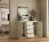 A modern living room with a beige sideboard, a painting, and decorative items. Podgląd zdjęcia produktu