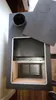 A top-down view of a wood-burning stove with the top plate removed, revealing the interior. Produktbild-Vorschau