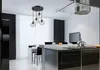 A modern kitchen and dining area with a pendant light fixture. Produktbild-Vorschau