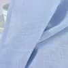 A close-up view of light blue fabric with a visible weave texture. Produktbild-Vorschau