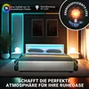 A bedroom scene with a bed and ambient lighting. Produktbild-Vorschau