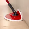A Vileda Spin & Clean floor mop cleaning a corner of a room. Podgląd zdjęcia produktu