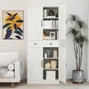 A white storage cabinet with doors and shelves is shown in a room with a couch and a plant. Podgląd zdjęcia produktu