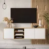A modern living room setup featuring a wall-mounted TV cabinet with a television, decorative items, and plants. Produktbild-Vorschau