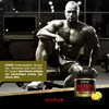 A muscular man is sitting in a gym, with a tub of Activlab Creatine Monohydrate in the foreground. Náhled obrázku produktu