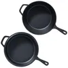 Two black cast iron pans are shown from a top-down perspective against a white background. Náhled obrázku produktu