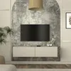 A modern living room setup with a wall-mounted TV and media console. Anteprima dell’immagine prodotto
