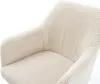 A close-up view of a beige corduroy armchair. Produktbild-Vorschau