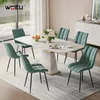 A dining room set with a marble-top table and six turquoise chairs. Produktbild-Vorschau