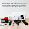 A collection of car dashcam accessories and packaging laid out on a wooden surface. Produktbild-Vorschau