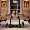 A dining table set for four in a well-lit room with a large arched window. Náhled obrázku produktu