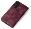 A burgundy flip case for a smartphone is shown from a diagonal top-down perspective on a white background. Produktbild-Vorschau