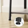 Close-up of the adjustable foot of a shelf unit. Produktbild-Vorschau