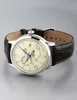 A watch with a leather strap is displayed against a neutral background. Produktbild-Vorschau
