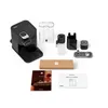 A collection of Nespresso coffee machine accessories and documentation laid out on a white background. Produktbild-Vorschau