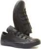 A pair of black leather Converse Chuck Taylor low-top sneakers are shown against a white background. Náhled obrázku produktu