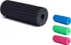A black foam roller is shown on the left, with three smaller foam rollers in blue, green, and pink on the right. Anteprima dell’immagine prodotto