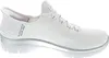 A white Skechers Slip-Ins sneaker with silver accents is shown from the side against a white background. Náhled obrázku produktu