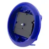 The back of a blue alarm clock with its internal mechanism visible. Produktbild-Vorschau