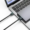Two USB cables are plugged into a laptop. Anteprima dell’immagine prodotto
