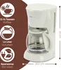 A white Clatronic coffee maker is shown with descriptive icons and text on a brown background with coffee bean patterns. Anteprima dell’immagine prodotto