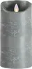 A close-up of a gray LED candle with a flickering flame. Produktbild-Vorschau