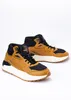 A pair of Puma X-Ray Speed Mid WTR winter boots are displayed against a white background. Voir les images du produit