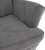 Close-up view of a gray velvet armchair. Anteprima dell’immagine prodotto