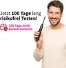 A man is smiling and holding an electric toothbrush. Produktbild-Vorschau