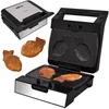 A taiyaki maker and finished taiyaki cakes. Podgląd zdjęcia produktu