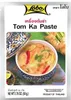 A product package for Tom Ka Paste with an image of the prepared dish. Podgląd zdjęcia produktu