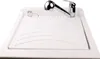 A white sink with a chrome faucet and a white soap dispenser. Voir les images du produit