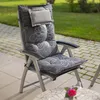 A garden chair with a patterned cushion on a patio. Produktbild-Vorschau
