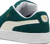 Close-up view of a green Puma Suede XL sneaker. Produktbild-Vorschau