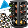 A rotating spice rack with multiple spice jars and a set of labels, a funnel, and a marker. Produktbild-Vorschau