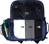 An open duffel bag with clothing and a water bottle inside. Voir les images du produit