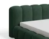 Close-up view of a green upholstered bed frame with a mattress. Voir les images du produit