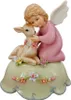 A porcelain figurine of an angel embracing a fawn, resting on a decorative base adorned with flowers. Produktbild-Vorschau