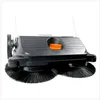 A robotic sweeper with large brushes is shown against a white background. Podgląd zdjęcia produktu