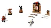 A collection of LEGO Ninjago minifigures and training accessories arranged on a white background. Produktbild-Vorschau