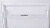 A close-up view of an empty shelf inside a refrigerator. Produktbild-Vorschau