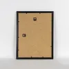 The back of a black picture frame is shown against a white background. Anteprima dell’immagine prodotto