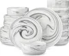 A stack of dinnerware with a marble-like pattern. Produktbild-Vorschau