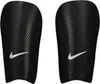 A pair of black Nike shin guards with white Nike swoosh logos. Produktbild-Vorschau
