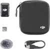 A collection of DJI Mic 2 transmitter components, including the transmitter, a carrying case, a windscreen, and a USB cable, arranged on a white background. Náhled obrázku produktu