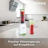 A kitchen counter with a blender and a smoothie. Podgląd zdjęcia produktu
