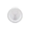 A close-up, top-down view of a white, ribbed filter. Produktbild-Vorschau